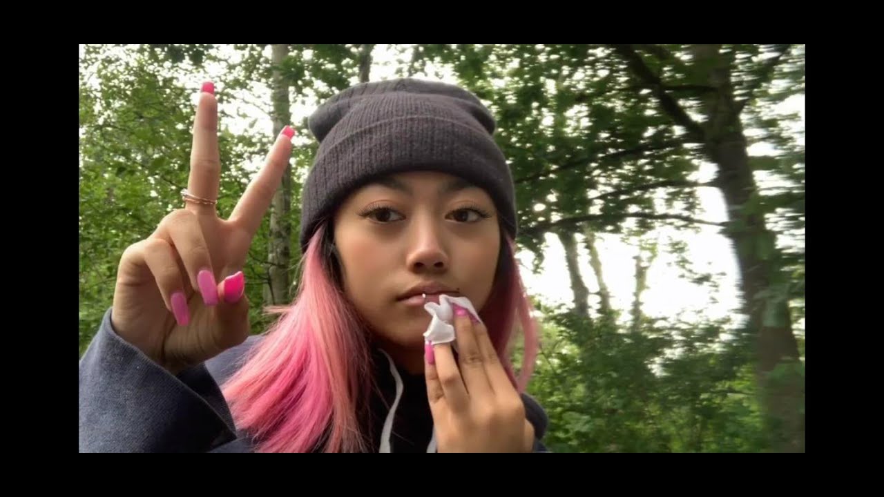 popping a pimple in a forest